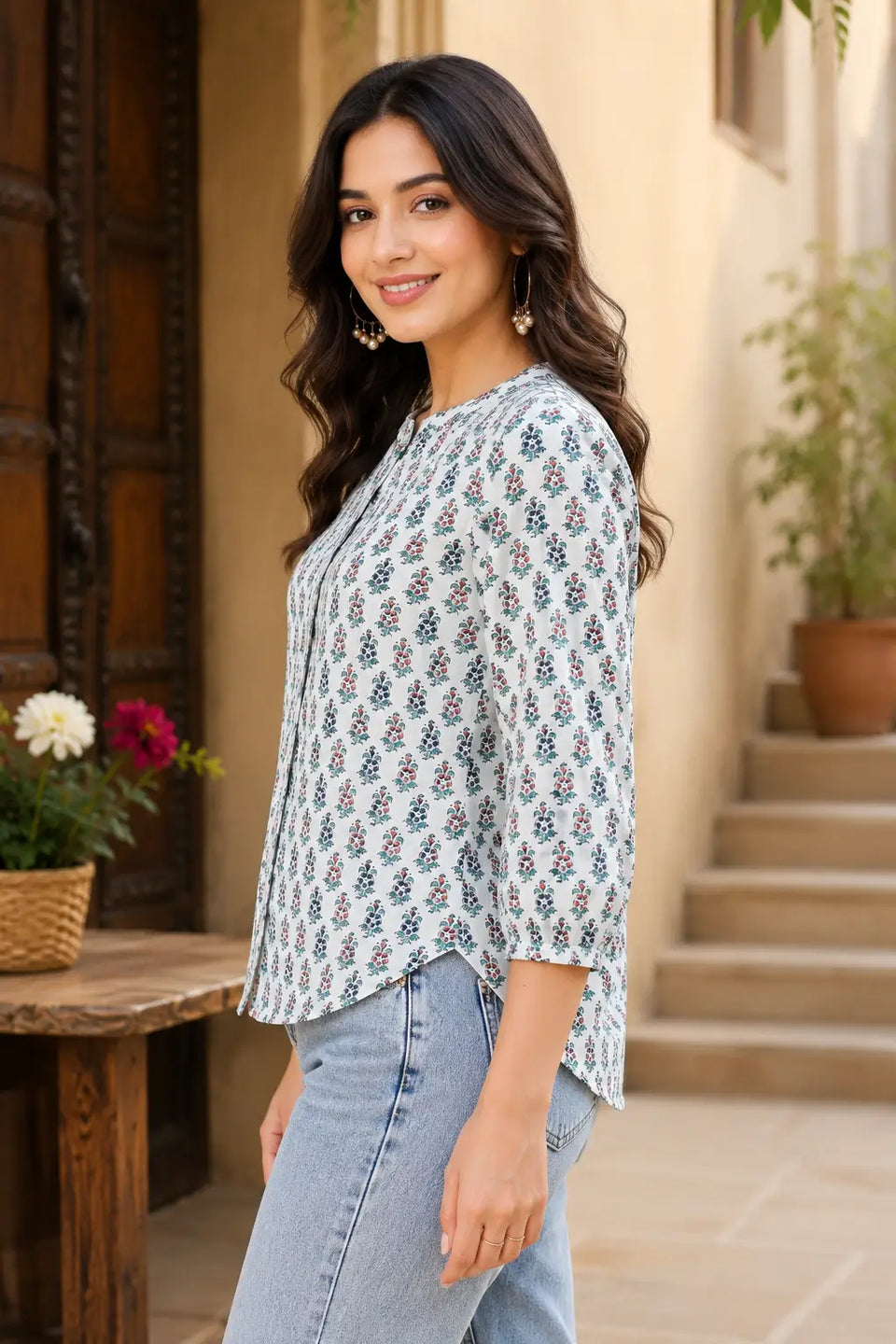 Side angle view of Rabric white floral cotton shirt style short top for women with relaxed casual fit