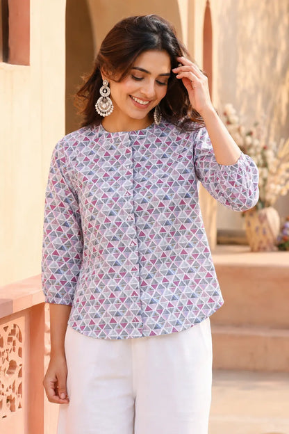 Full length fashion look of Rabric white floral cotton short top for women paired with wide leg denim jeans