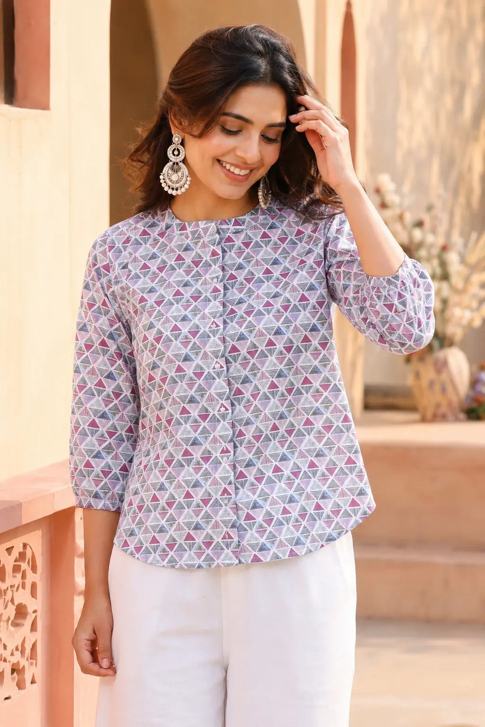Full length fashion look of Rabric white floral cotton short top for women paired with wide leg denim jeans