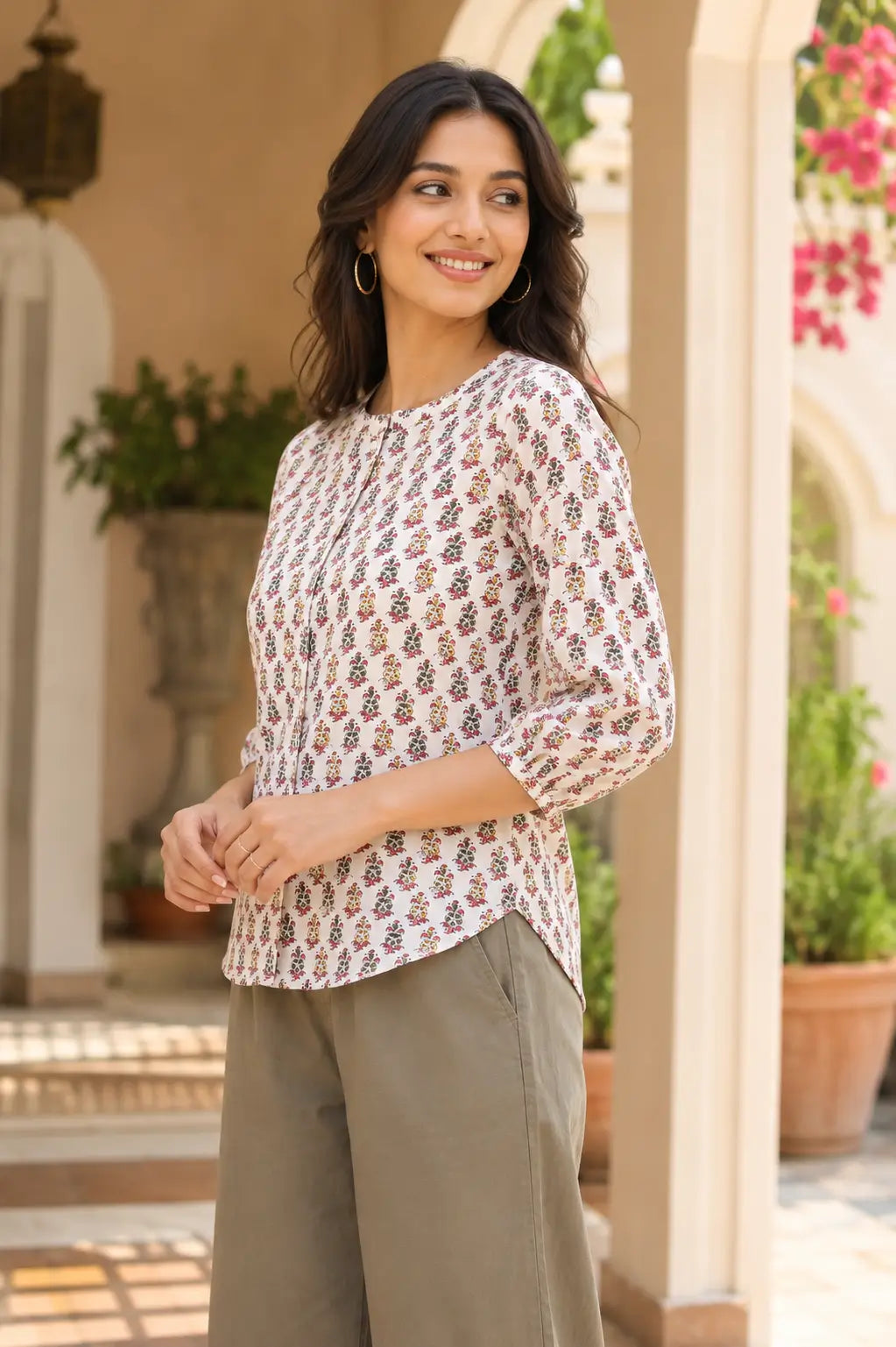 Side angle view of Rabric white floral cotton short top for women with stylish casual fit and 3/4 sleeves