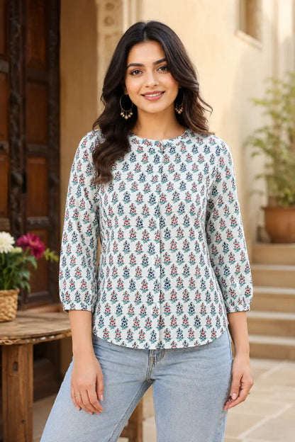 Full length fashion look of Rabric white floral cotton short top for women paired with wide leg denim jeans