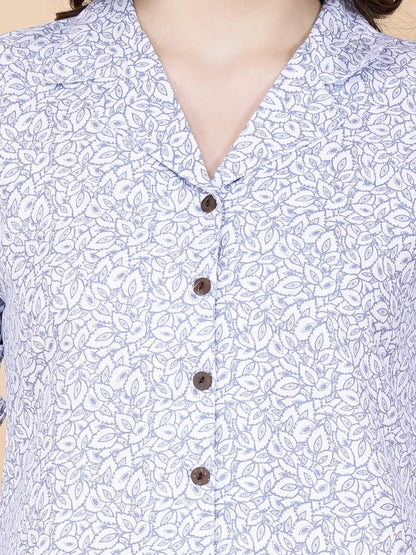 Close-up of glace cotton printed fabric and buttons