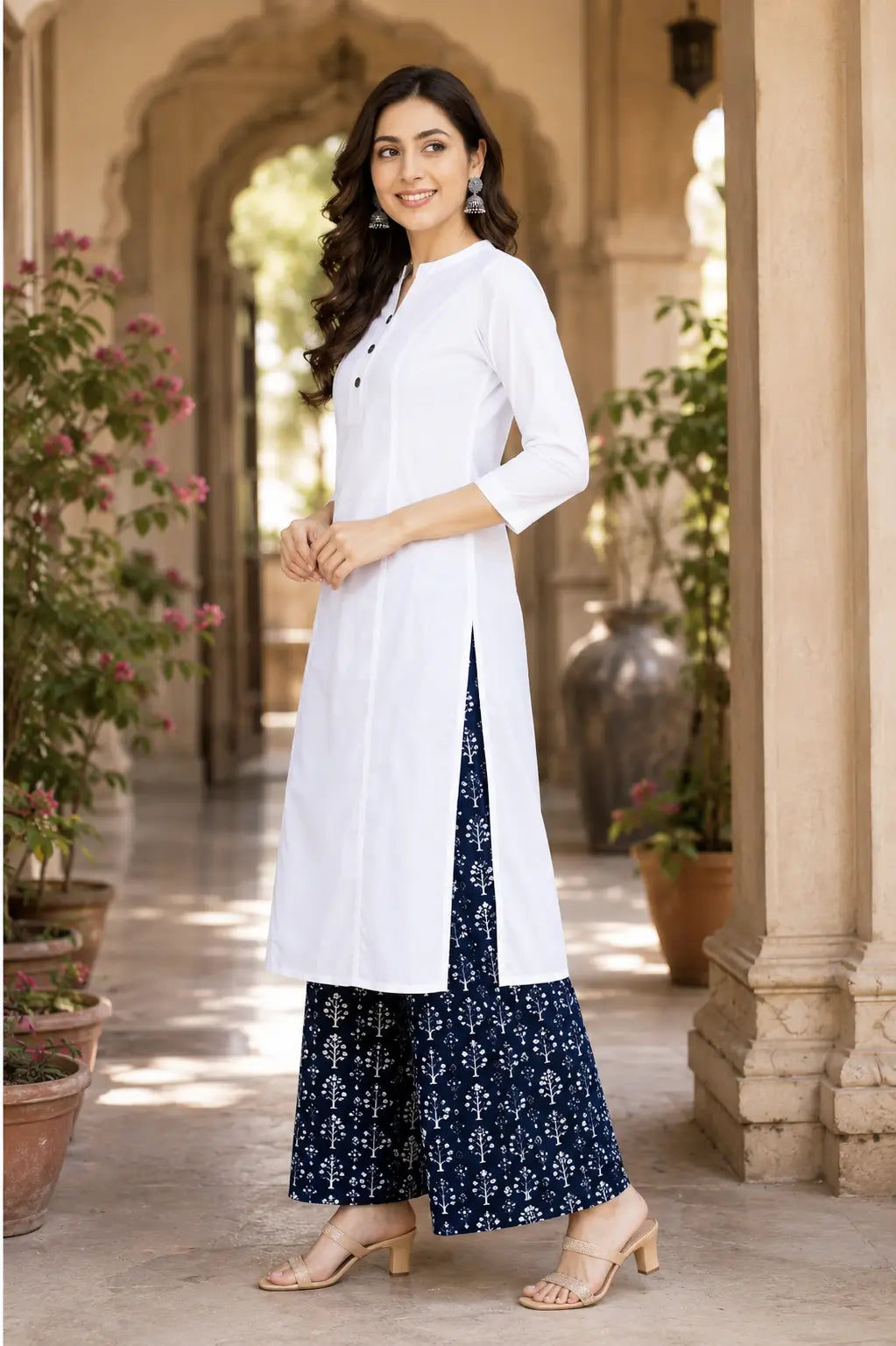 Side angle of white popline cotton straight kurti for women with side slit design and 3/4 sleeves by Rabric