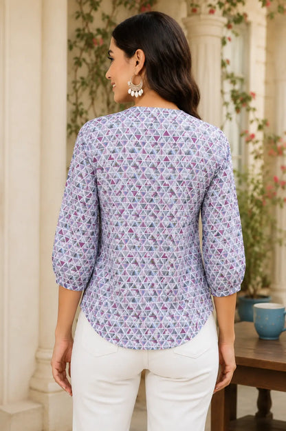 Back view of Rabric white floral printed cotton short top for women with 3/4 elastic sleeves and curved hem design