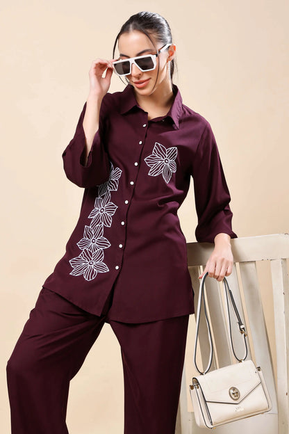 Flat lay of Rabric wine embroidered co-ord set with button-down top and trouser