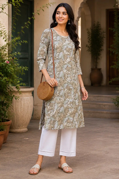 Stylish lifestyle look of Rabric women beige floral rayon kurti paired with white pants and casual accessories