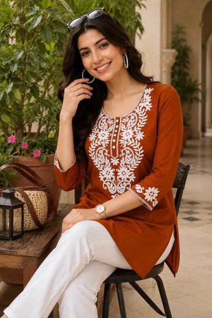 Women casual ethnic cotton short top in sitting pose with elegant embroidery and modern styling