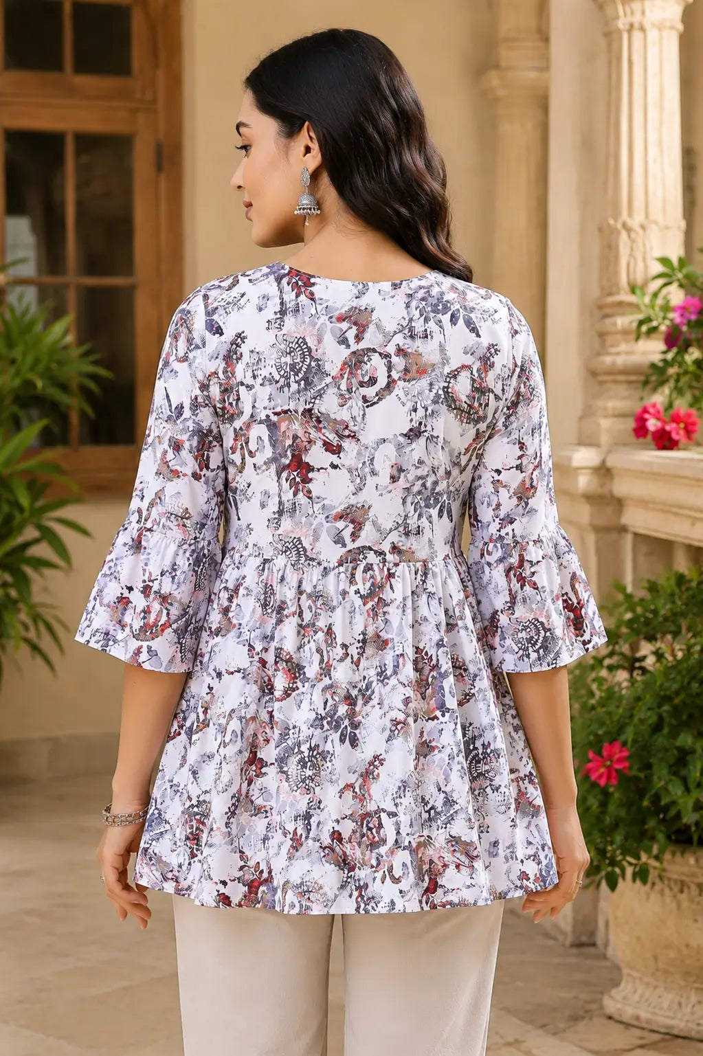 Back view of Rabric women floral cotton short kurti with flare design and 3/4 sleeves