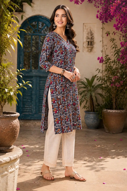 Side angle view of Rabric navy blue cotton straight fit kurti for women with stylish ethnic print and side slit