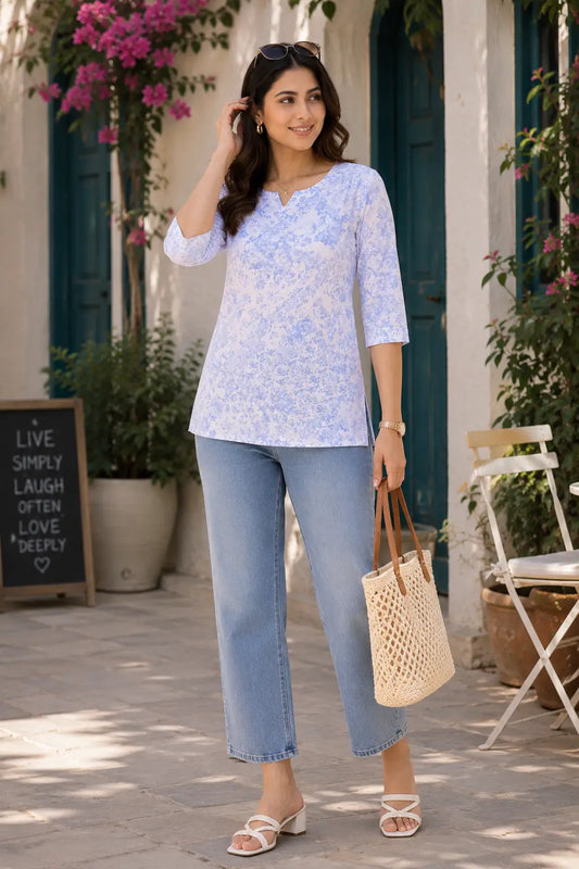 Women wearing Rabric white blue floral cotton short top with denim jeans in stylish casual lifestyle look