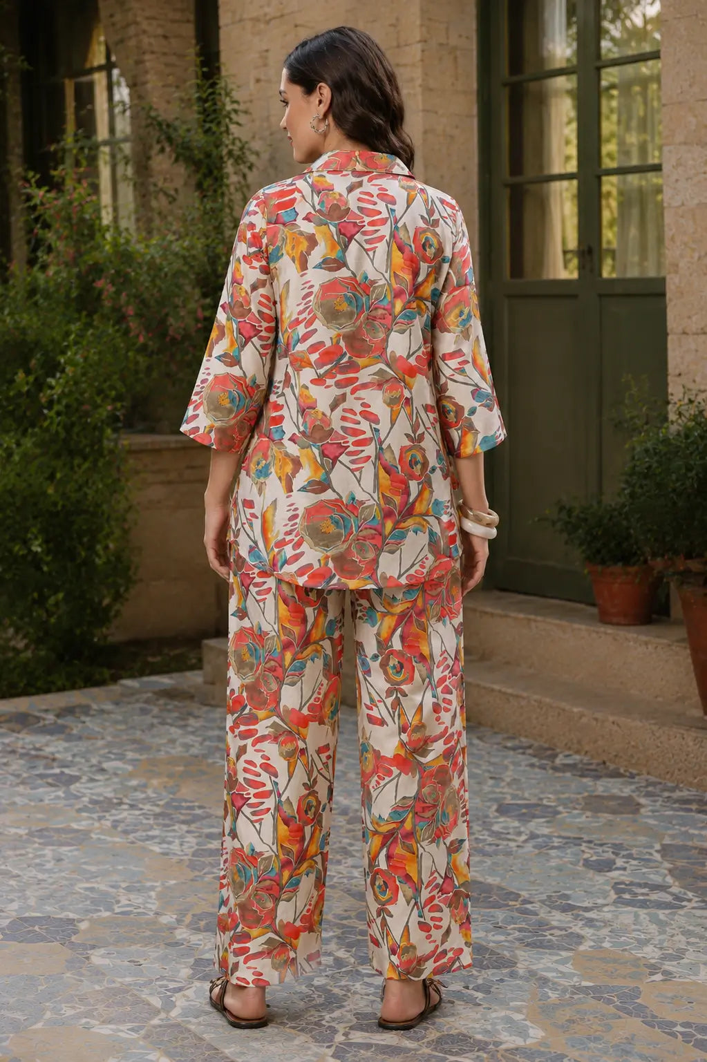 Back view of Rabric women floral printed rayon co-ord set featuring 3-4 sleeves short shirt and relaxed fit pants