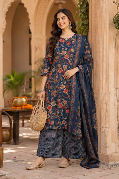 Stylish woman wearing navy blue cambric cotton floral kurta pant set with dupatta by Rabric