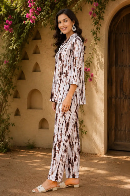 Side angle view of Rabric stylish rayon co-ord set for women in brown white abstract animal print with 3/4 sleeves
