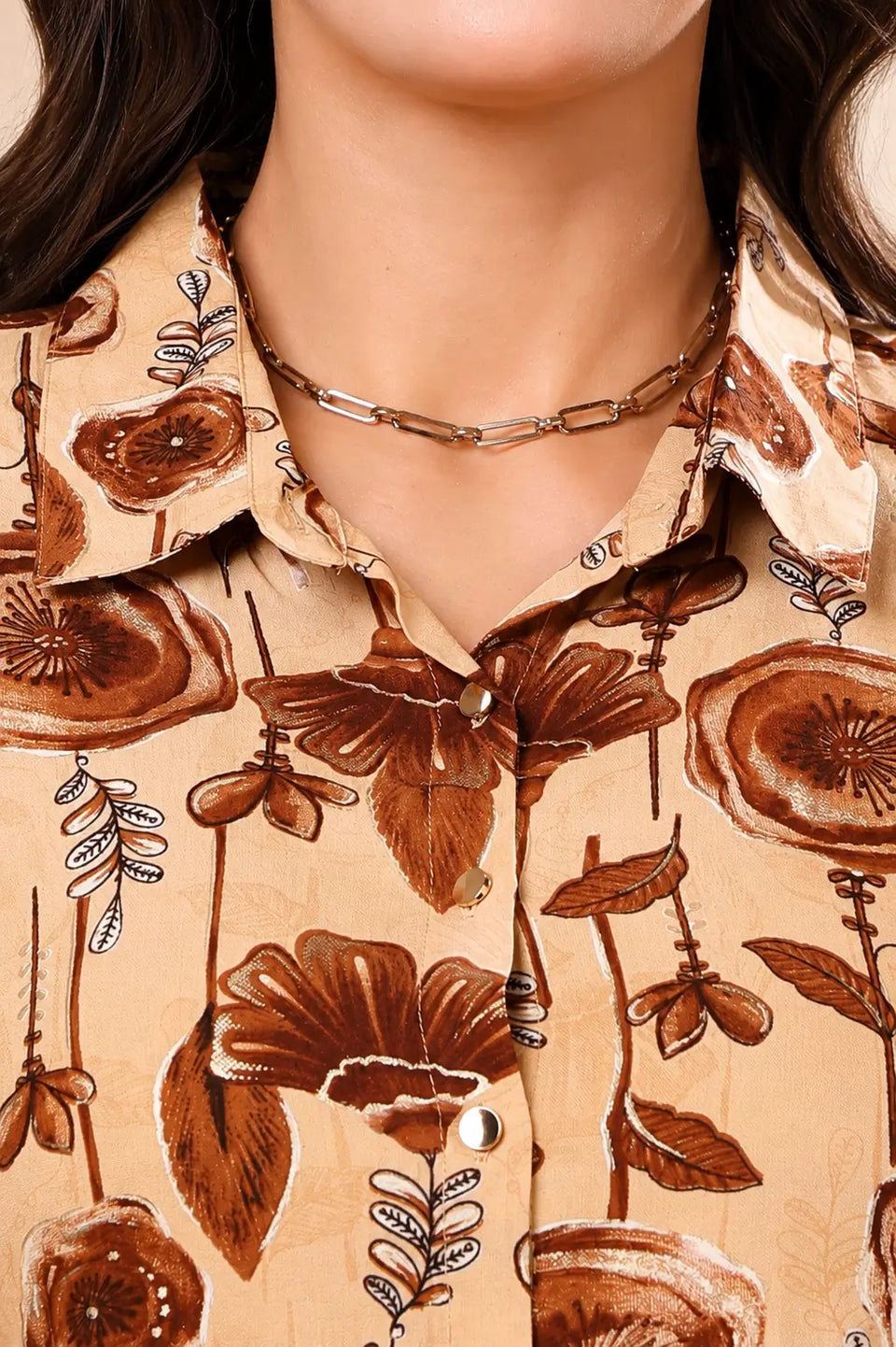 Close-up neck design of Rabric beige brown floral rayon co-ord set with collared button-down shirt detail