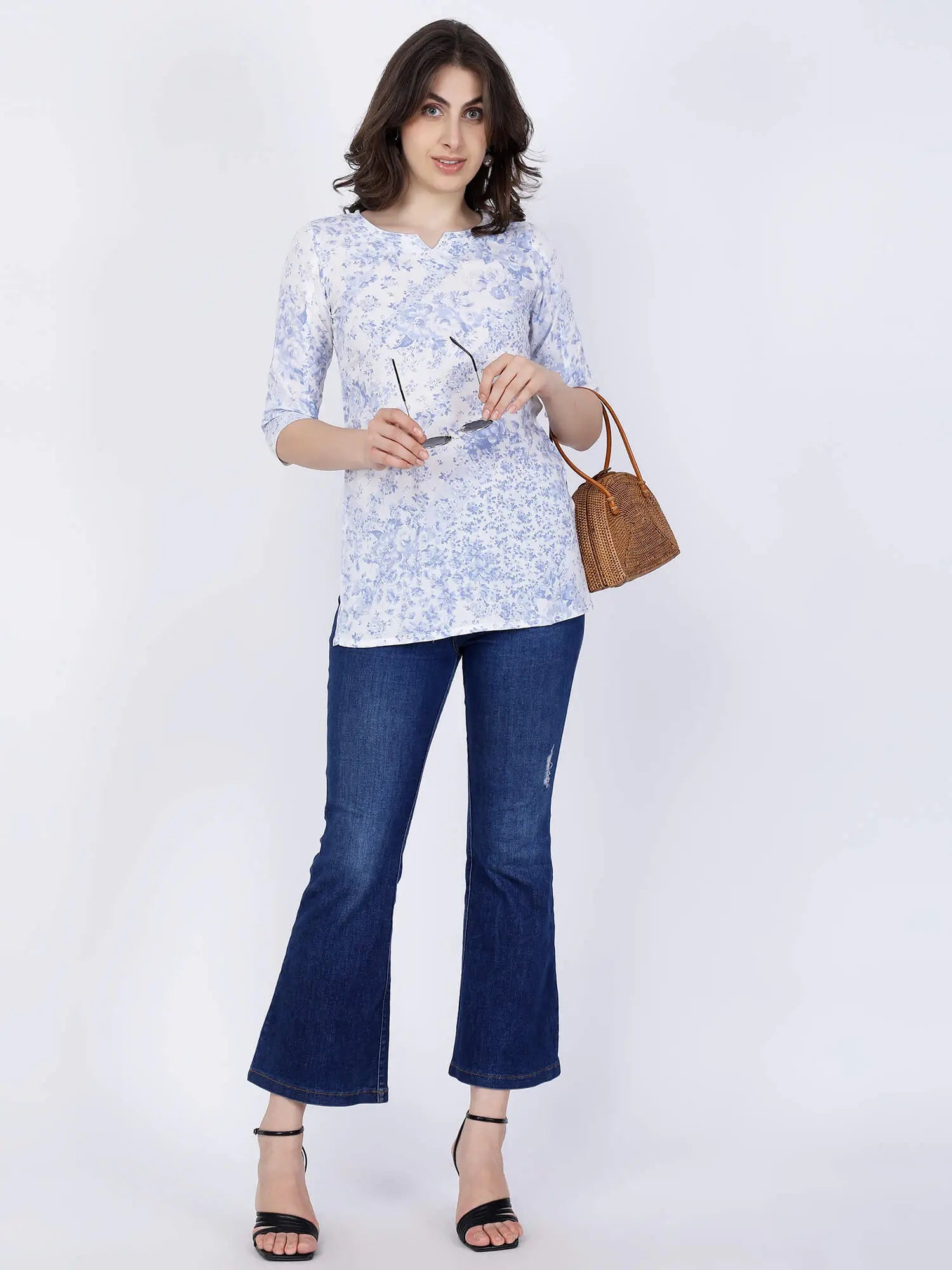 Trendy women’s ethnic short kurti top in sky blue and white by Rabric