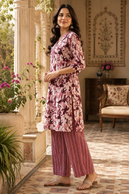 Side angle view of women pink maroon cotton printed kurta pant set with 3/4 sleeves by Rabric