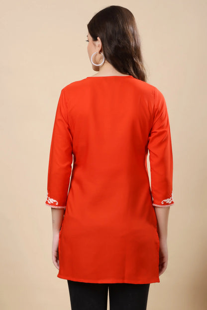 Women’s red embroidered V-neck Crepe kurti by Rabric Stores