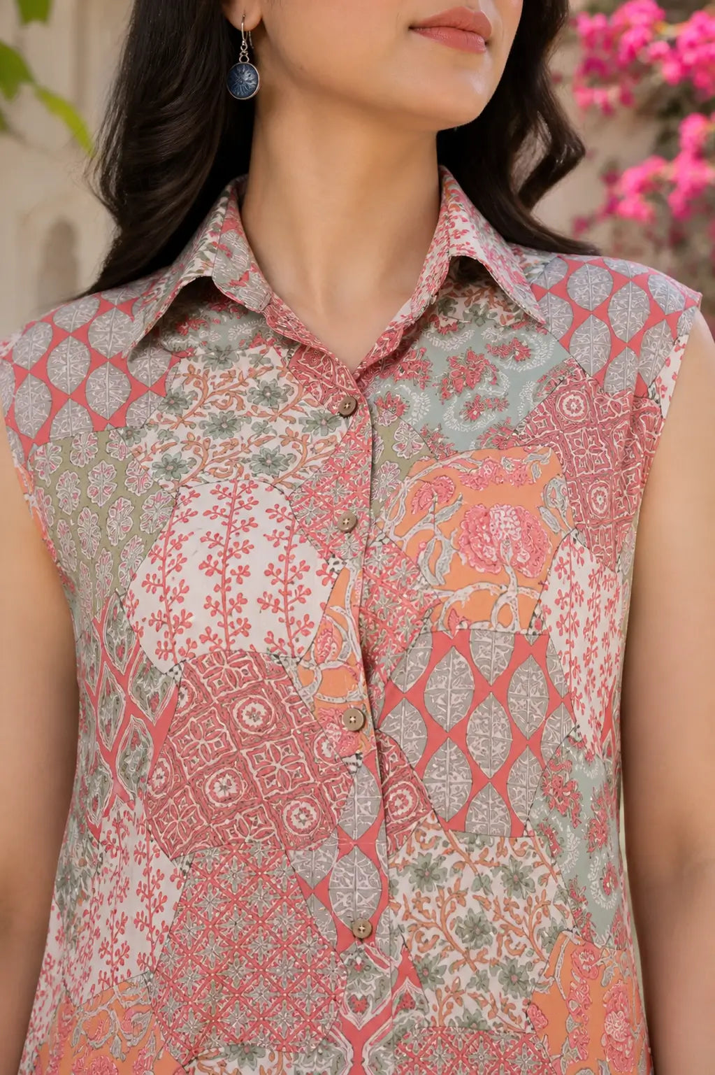 Closeup of RABRIC sleeveless printed kurta in pastel pink and sage green tones