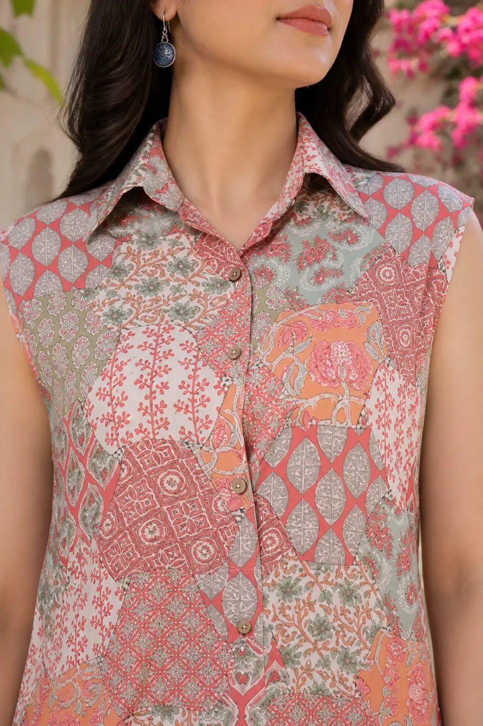 Closeup of RABRIC sleeveless printed kurta in pastel pink and sage green tones