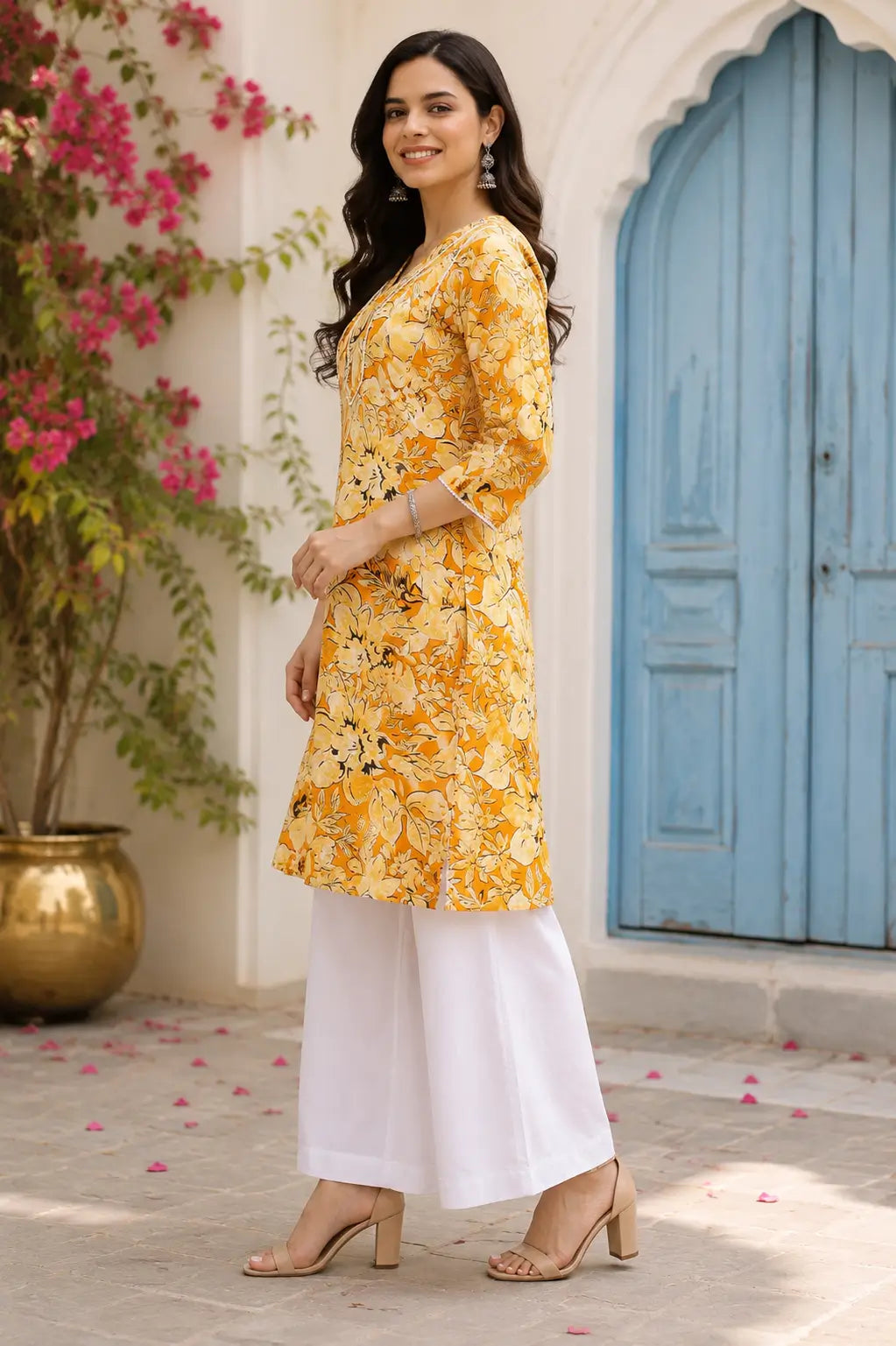 Side view of Rabric yellow floral cotton kurti paired with white palazzo pants stylish women ethnic outfit