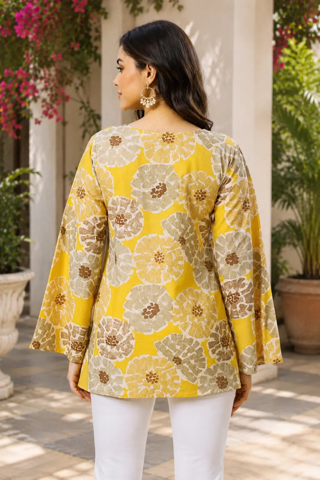 Back view of RABRIC yellow floral printed casual top for women