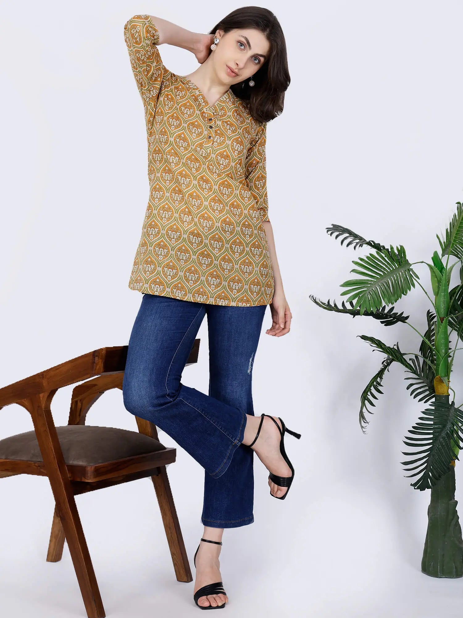 Women’s short kurti styling idea in mustard yellow by Rabric