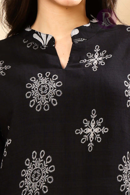 Close-up of soft Vertican Silk fabric with ethnic print detailing