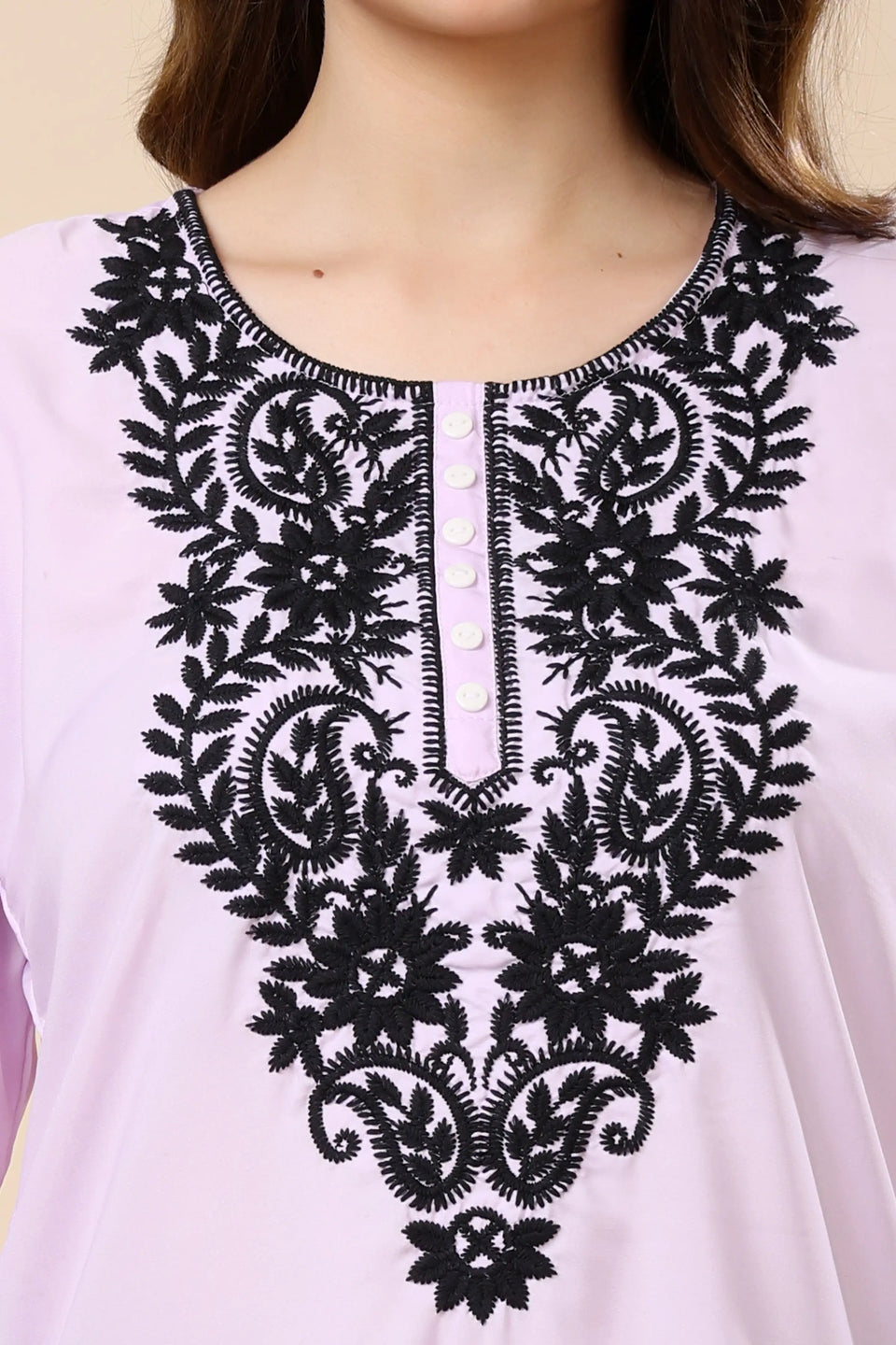 V neck short kurti for ladies in soft crepe fabric with elegant embroidery by Rabric