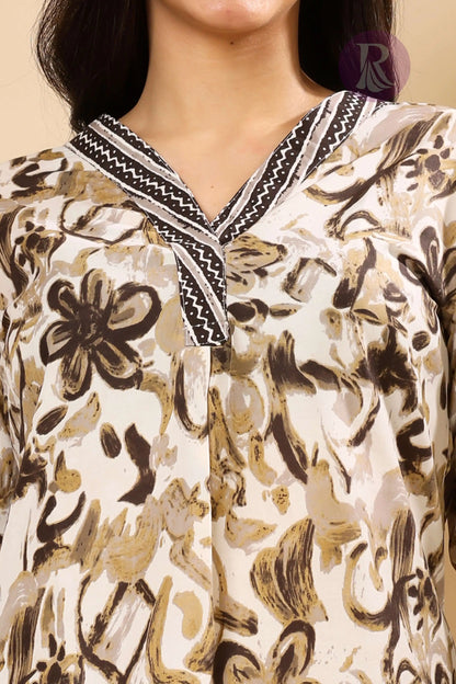 Close-up of V-neck kurta with thread work design in cotton slub fabric for women
