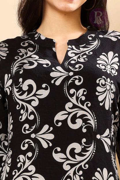 Close-up of vertican silk fabric and silver floral print in Rabric co-ord set